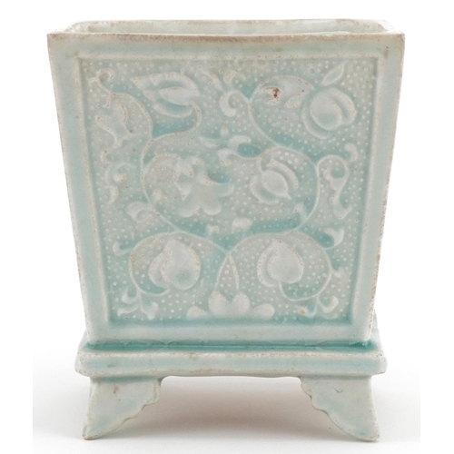 1297 - Chinese porcelain turquoise glazed four footed incense burner decorated with foliage, 16cm high