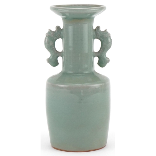 1067 - Chinese porcelain celadon glazed Rouleau vase with twin animalia handles, 19cm high