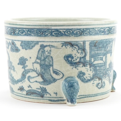 1069 - Chinese blue and white porcelain three footed incense burner hand painted with figures and pagodas, ... 