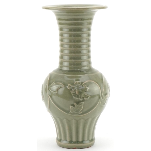 1147 - Chinese porcelain vase having a celadon glaze decorated in relief with flowering vines, 29cm high