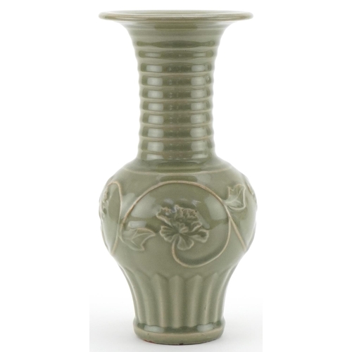 1147 - Chinese porcelain vase having a celadon glaze decorated in relief with flowering vines, 29cm high