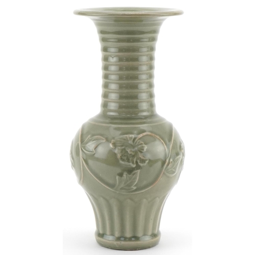 1147 - Chinese porcelain vase having a celadon glaze decorated in relief with flowering vines, 29cm high