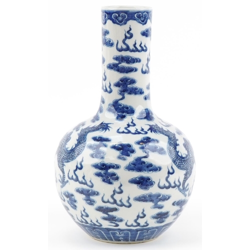 1059 - Chinese blue and white porcelain vase hand painted with dragons chasing the flaming pearl amongst cl... 