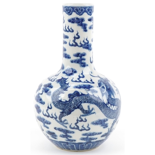 1059 - Chinese blue and white porcelain vase hand painted with dragons chasing the flaming pearl amongst cl... 