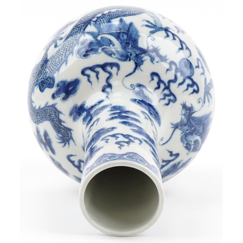 1059 - Chinese blue and white porcelain vase hand painted with dragons chasing the flaming pearl amongst cl... 