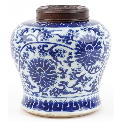 1360 - Chinese blue and white porcelain jar with wooden cover hand painted with flowers and foliage, 22cm h... 