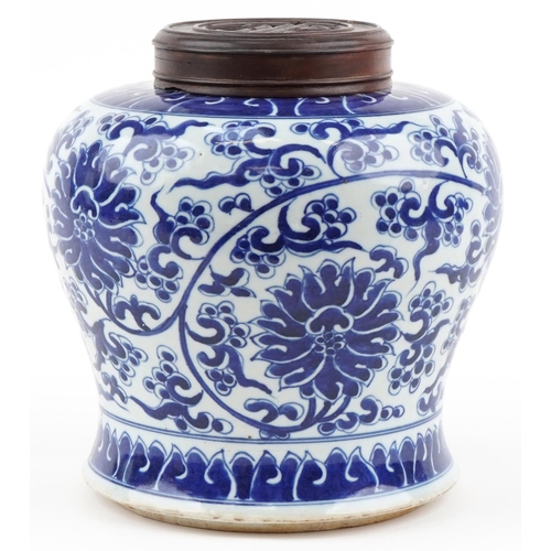 1360 - Chinese blue and white porcelain jar with wooden cover hand painted with flowers and foliage, 22cm h... 