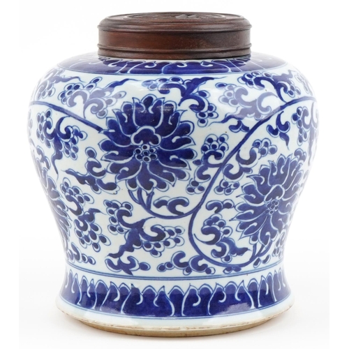 1360 - Chinese blue and white porcelain jar with wooden cover hand painted with flowers and foliage, 22cm h... 