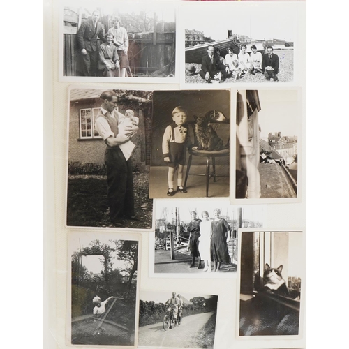 2494 - Family album of black and white photographs including motorbikes, family gatherings together with a ... 