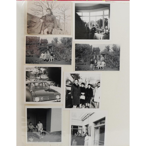 2494 - Family album of black and white photographs including motorbikes, family gatherings together with a ... 