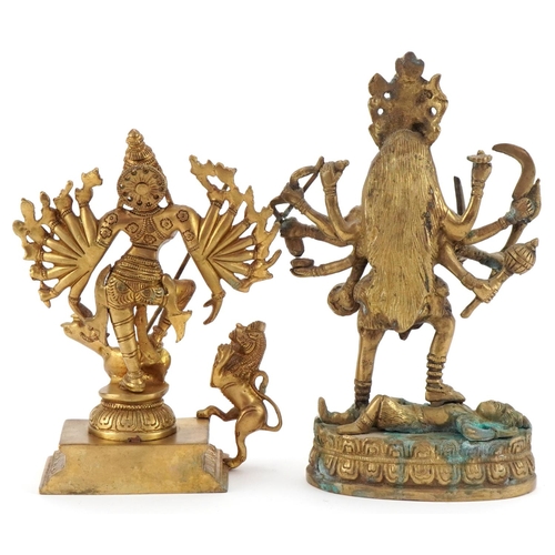 1306 - Chino-Tibetan Buddha together with a similar figure of a warrior, the largest 25cm high