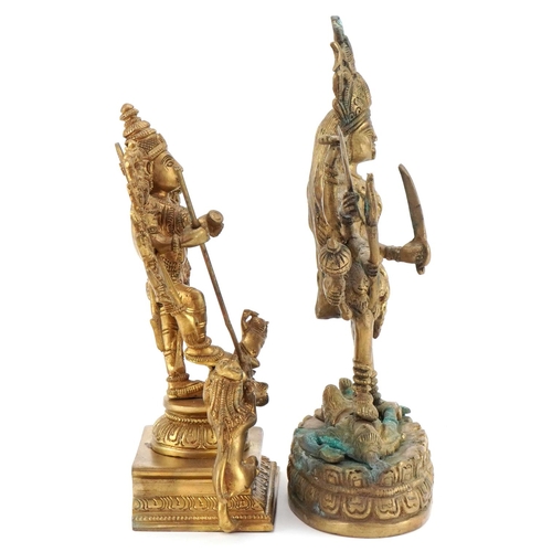 1306 - Chino-Tibetan Buddha together with a similar figure of a warrior, the largest 25cm high