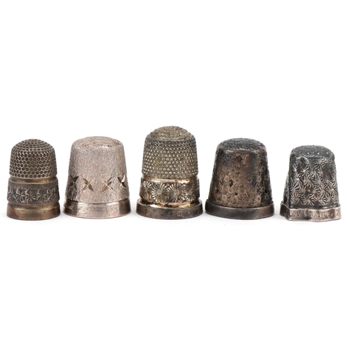 1274 - Five Edwardian and later silver thimbles, the largest 2.4cm high, total 22.5g