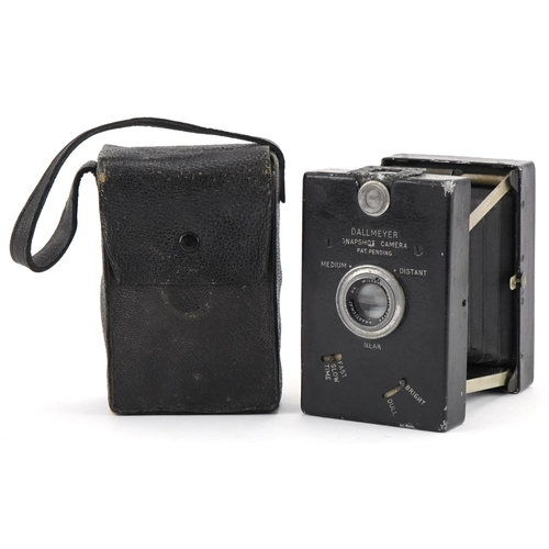 1556 - Dallmeyer snap shot camera housed in original leatherette case, 11cm H x 7cm W x 4.5cm D