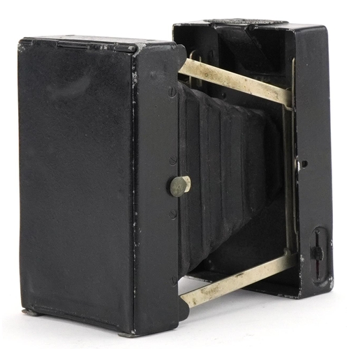 1556 - Dallmeyer snap shot camera housed in original leatherette case, 11cm H x 7cm W x 4.5cm D