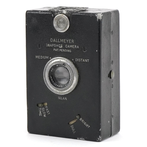 1556 - Dallmeyer snap shot camera housed in original leatherette case, 11cm H x 7cm W x 4.5cm D