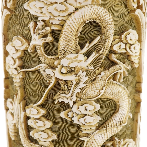 2173 - Chinese cinnabar lacquer style vase decorated with a dragon, 19cm high