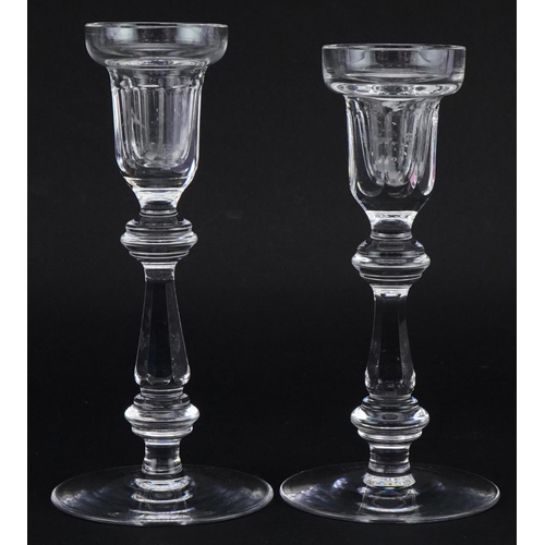 2129 - Two Waterford Crystal candlesticks, the largest 20.5cm high