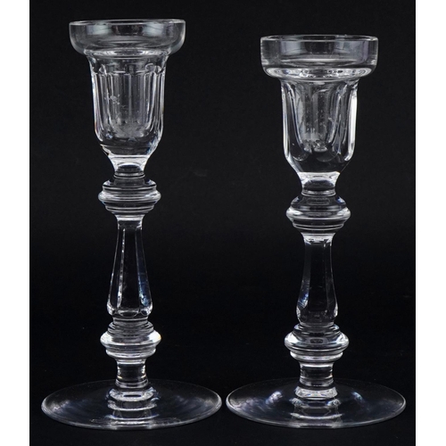 2129 - Two Waterford Crystal candlesticks, the largest 20.5cm high