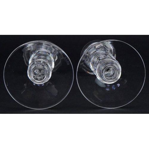 2129 - Two Waterford Crystal candlesticks, the largest 20.5cm high