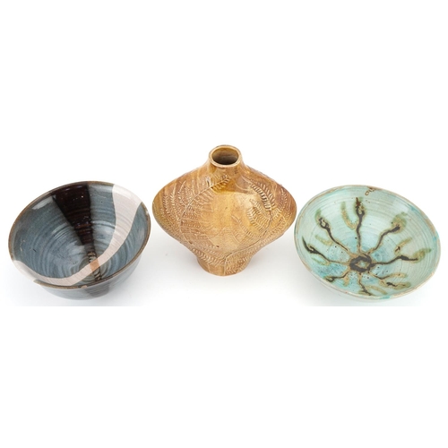 398 - Two studio pottery bowls and a vase, the vase by Tessa Rubbra having a brown glaze with fern leaves,... 