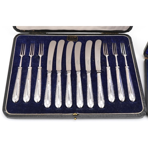 1339 - Set of six silver teaspoons with matched sugar tongs and a set of six silver handled knives and fork... 