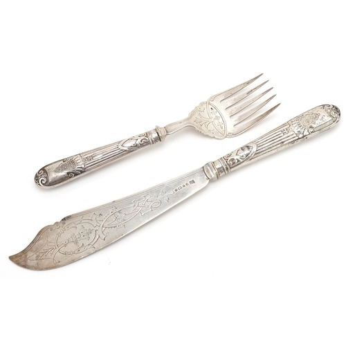 1128 - Fenton Brothers, pair of Victorian silver fish servers, Sheffield 1874, the largest 33cm in length, ... 