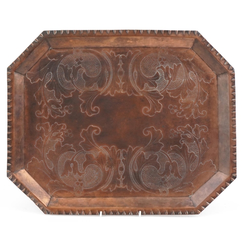 129 - Arts & Crafts copper tray with stylized floral decoration, 48cm x 38cm