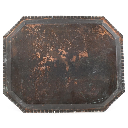 129 - Arts & Crafts copper tray with stylized floral decoration, 48cm x 38cm