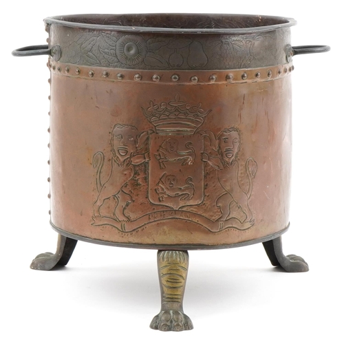 116 - Arts & Crafts copper log bucket decorated with a panel of fruit and coat of arms of Freesland, mount... 