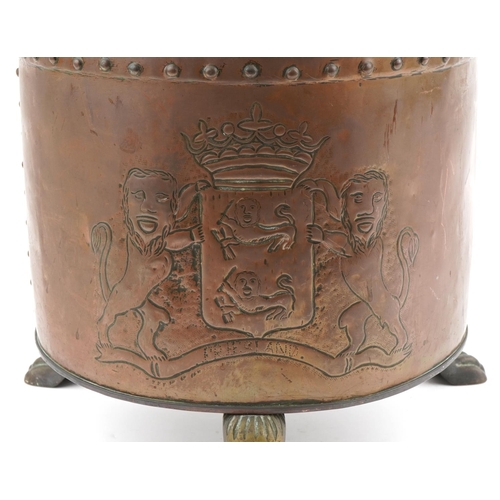 116 - Arts & Crafts copper log bucket decorated with a panel of fruit and coat of arms of Freesland, mount... 