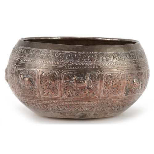 1125 - Indian white metal bowl profusely embossed with wild animals, 12cm in diameter, 140.5g