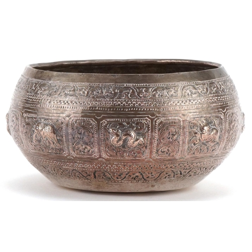 1125 - Indian white metal bowl profusely embossed with wild animals, 12cm in diameter, 140.5g