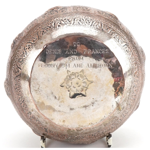 1125 - Indian white metal bowl profusely embossed with wild animals, 12cm in diameter, 140.5g