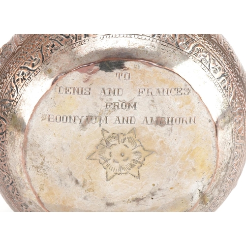 1125 - Indian white metal bowl profusely embossed with wild animals, 12cm in diameter, 140.5g