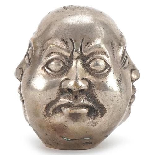 2206 - Chinese white metal Buddha four face scroll weight, four figure character marks to the base, 6cm hig... 