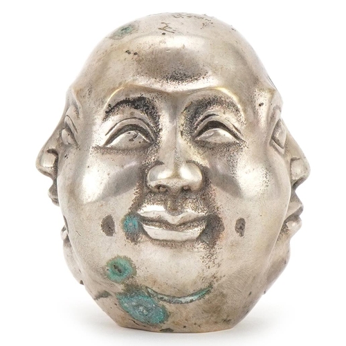 2206 - Chinese white metal Buddha four face scroll weight, four figure character marks to the base, 6cm hig... 