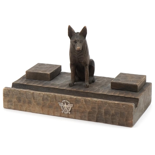 2572 - German military World War II chip carved wood police desk stand mounted with a dog, 25cm wide