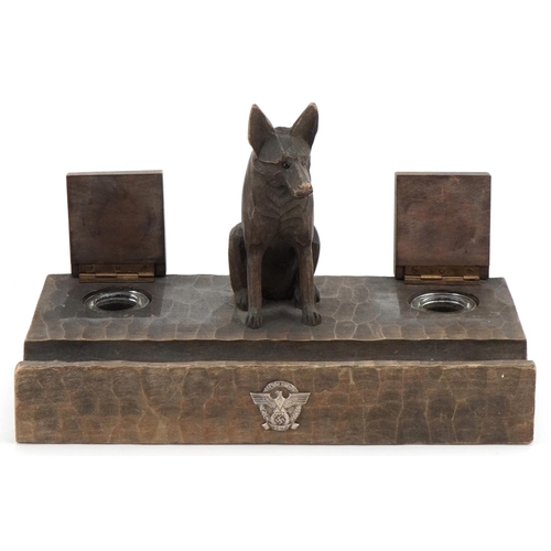 2572 - German military World War II chip carved wood police desk stand mounted with a dog, 25cm wide