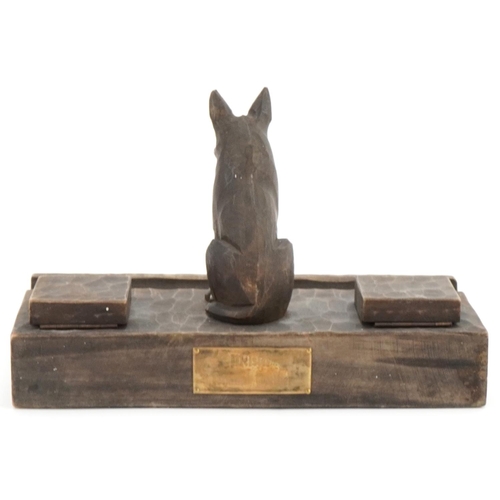 2572 - German military World War II chip carved wood police desk stand mounted with a dog, 25cm wide