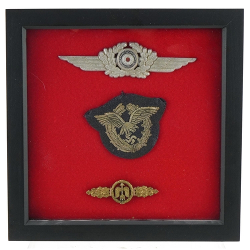 2571 - Three German military World War II Luftwaffe badges housed in a glazed display case, overall 24.5cm ... 