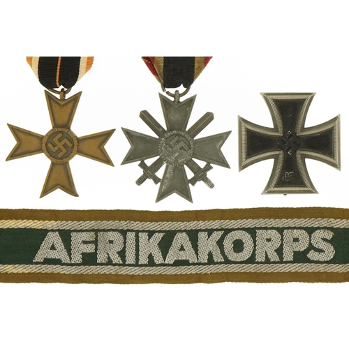 2569 - German militaria including 1939 Merit Cross and Afrika Korps cuff title