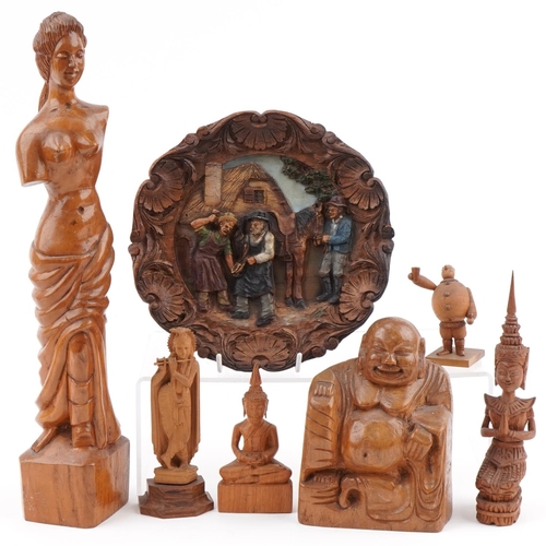 2276 - Carved wooden items including Tibetan Buddhas and Venus de Milo, the largest 40cm high