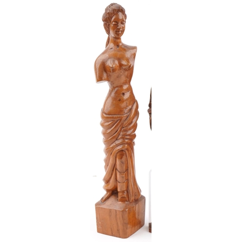 2276 - Carved wooden items including Tibetan Buddhas and Venus de Milo, the largest 40cm high