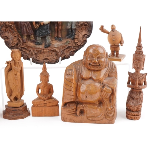 2276 - Carved wooden items including Tibetan Buddhas and Venus de Milo, the largest 40cm high