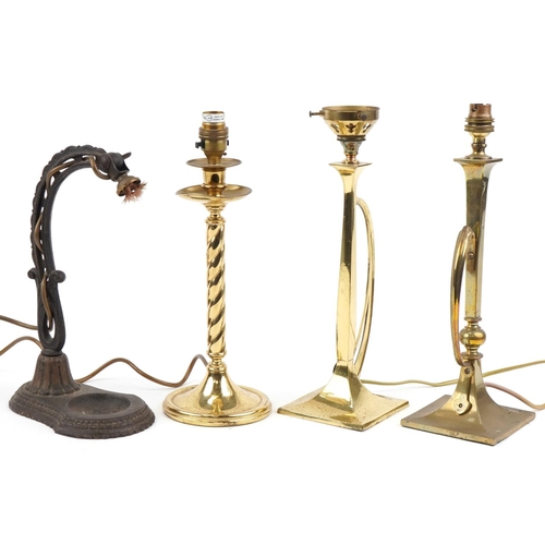 2287 - Four Arts & Crafts style table lamps including a wrought iron example, the largest 35cm high