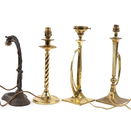 2287 - Four Arts & Crafts style table lamps including a wrought iron example, the largest 35cm high