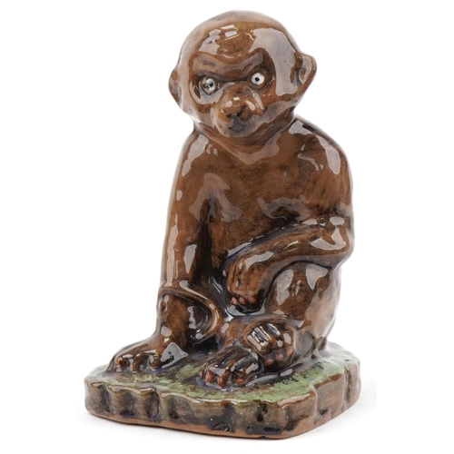 231 - Arts & Crafts hand painted Majolica pottery monkey, 23cm high