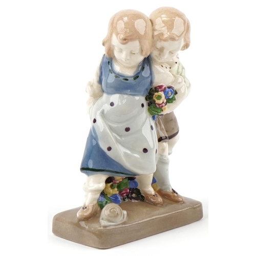 476 - Austrian Secessionist model of boy and girl numbered 10344 to the base, 16cm high