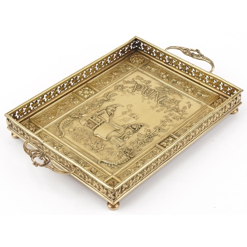 67 - Arts & Crafts brass Punch & Judy pierced brass gallery tray, 3cm H x 36cm W x 24cm D including the h... 